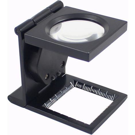 Loupe compte-fils pliable à monture en métal peint en noir — Un outil double fonction : mesure et grossissement
