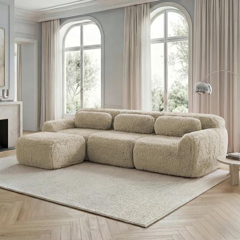 Ce canapé d'angle modulable est revêtu d'un tissu doux, possède une structure sans cadre et est livré entièrement monté. Il est fourni avec des coussins, (1/5)