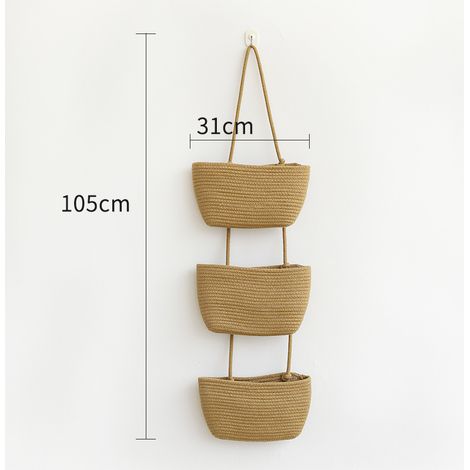 Cesta colgante de pared de tres niveles, fabricada en algodón, para guardar artículos del hogar (marrón, 3 niveles, 105 x 31 x 10 cm). (1/5)