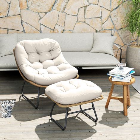Chaise en rotin naturel avec tabouret et coussin, repose-pieds réglables inclus pour un confort d'assise optimal. (1/5)