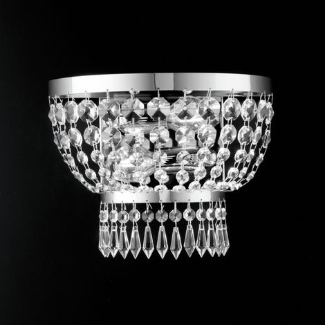 Aplique imperial de hierro y latón cromado con dos luces 27x h22 cm