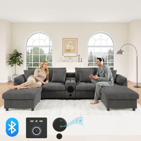 Canapé modulable en forme de U ou de L, avec haut-parleur Bluetooth et console. Canapé d’angle équipé de compartiments pour ranger des objets. Possibilité d’utiliser un éclairage sans fil. Prises USB (1/5)