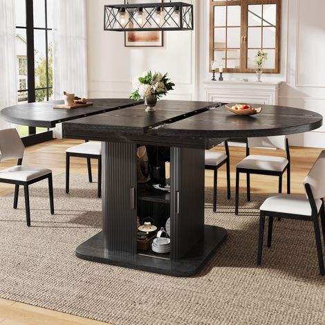 Tavolo ovale allungabile con contenitore 110–149,8 x 110 x 75 cm, MDF e metallo, nero DESVIAE (1/5)