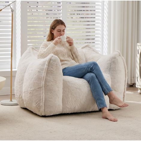 Fauteuil pouf géant avec coussin, canapé de sol en fausse fourrure 123x97x73 cm beige REDOM (1/5)