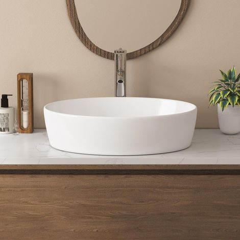 Vasque à poser céramique ovale blanche 55 x 41 x 14cm – Surface ultra-lisse – Écoulement rapide – ERIVB047 – Eridanus (1/5)