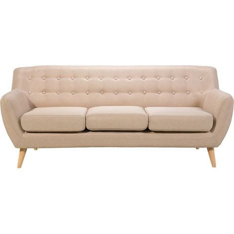 Sofá 3 plazas tapizado beige con respaldo copetudo patas de madera clara acolchadas gruesas sala de estar minimalista escandinava Motala