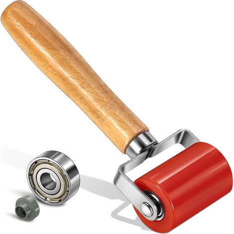 Outil de pose pour insonorisation automobile : rouleau presseur amélioré en polyuréthane (PU) doté de deux roulements, conçu pour l'installation de matériaux d'insonorisation automobile. (1/5)