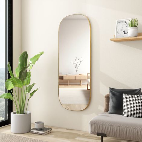 Miroir mural ovale aux lignes harmonieuses avec cadre en métal doré de style moderne élégant, idéal pour la décoration intérieure (1/5)