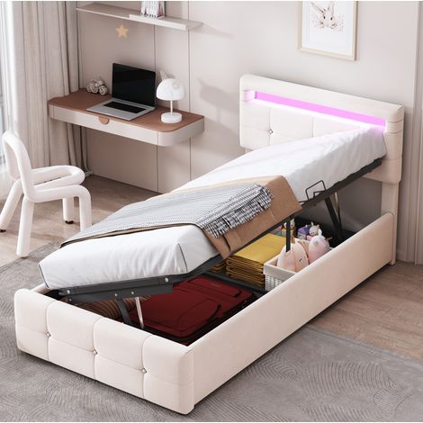 Cama infantil tapizada 90/200 cm beige de terciopelo con LED y almacenaje hidráulico (1/5)