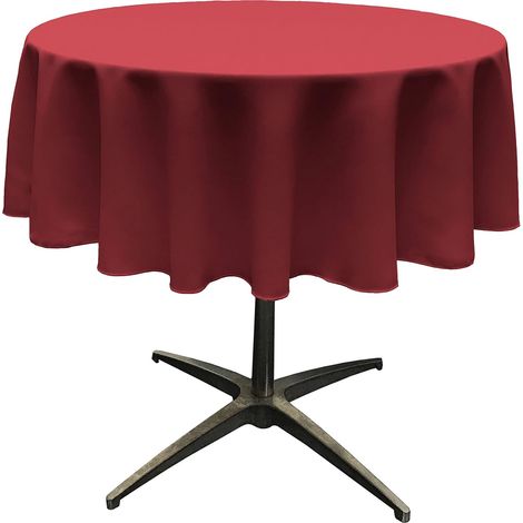 Nappe ronde, en polyester, jetable, unie. (1/4)