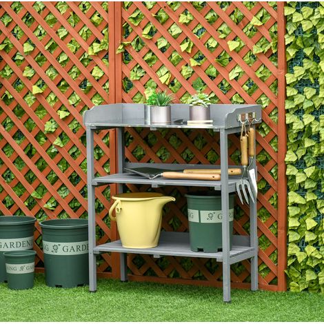 Tavolo da giardinaggio 76x37x89 cm grigio in legno con piano in metallo e vani portaoggetti (1/5)