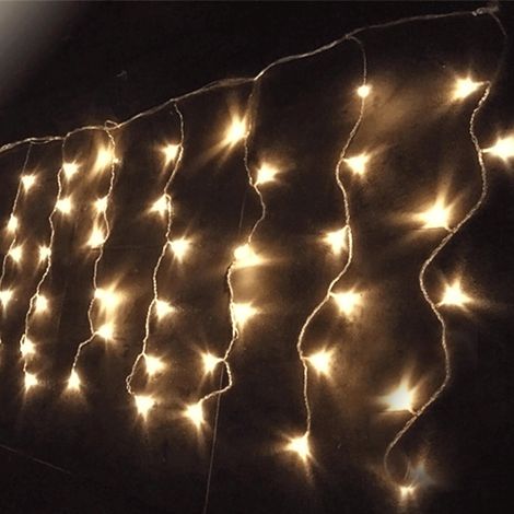 Guirlande lumineuse LED encastrée type stalactite, batterie 3AA, blanc chaud, 10 m x 0,4 m, idéale pour les décorations de Noël et les événements. (1/3)