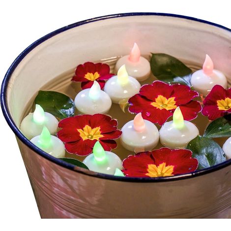 Set 4 candeline multicolor tea light galleggianti con led RGB e batterie incluse.