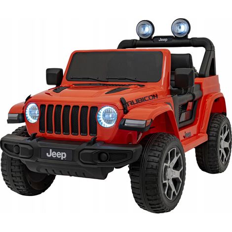 Jeep Wrangler Rubicon eléctrico para niños, color naranja, con control remoto delantero. (1/5)