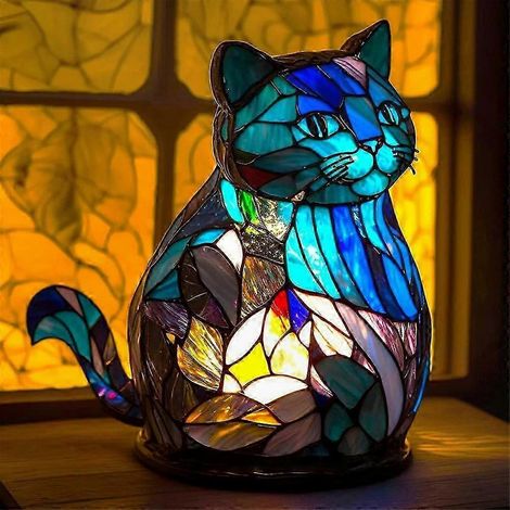 Elegante Tischleuchte mit Tiermotiv, Nachtlicht aus farbigem Kunstharz in Buntglasoptik für Büro oder Schlafzimmer. (1/5)