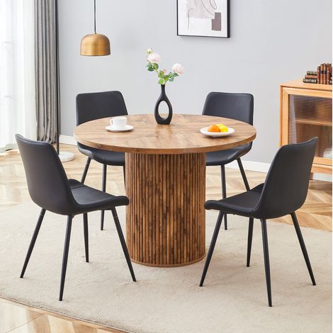 Juego de comedor moderno: mesa redonda de 100 cm en MDF efecto madera y 4 sillas negras de PU (1/5)