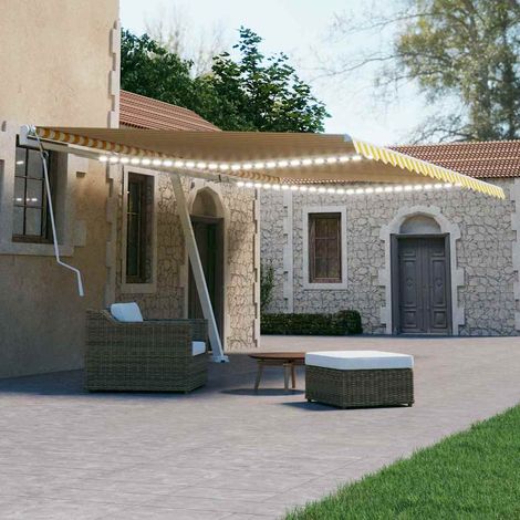 vidaXL Manual Retractable Awning with LED 600x300 cm Yellow and White (1/5)