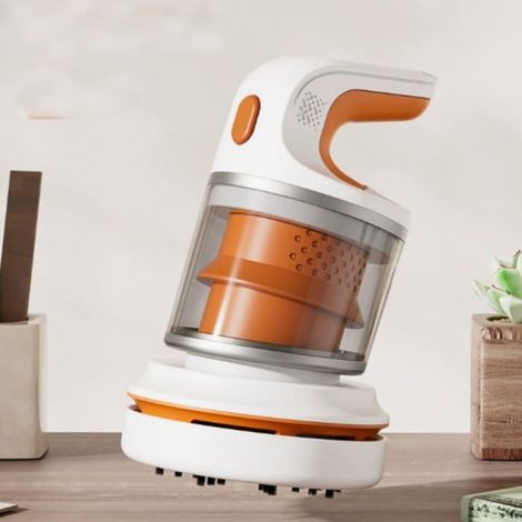 Mini aspirateur de bureau sans fil rechargeable USB orange avec embout pour les recoins et outil de nettoyage pour clavier, portable (1/5)