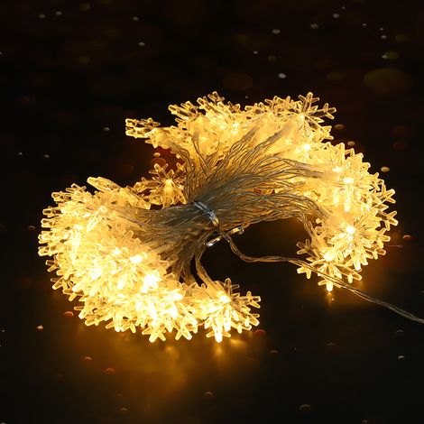 Guirlande lumineuse à 50 LED en forme de flocon de neige, à suspendre à la maison, pour décorer une commode ou une fête. (1/5)