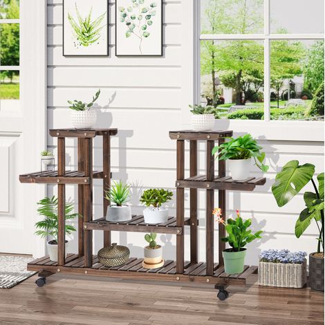Estantería para plantas de madera maciza marrón oscuro con 6 baldas y 4 ruedas, 123,5x33x80 cm (1/5)
