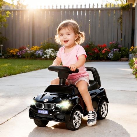 Voiture pour enfants, véhicule à pousser avec coffre à jouets, klaxon, phares et musique, 63,5 x 28 x 36 cm, noire (1/5)