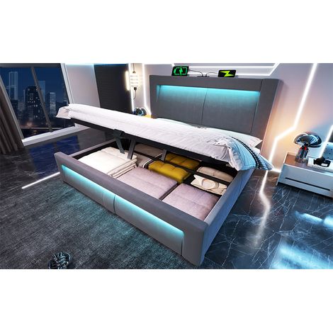 Letto contenitore in velluto grigio 140x200 cm con materasso incluso, LED, USB e USB-C, base a doghe.