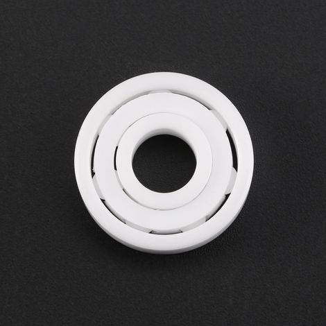 1 bille miniature en céramique ZrO2 blanche (8 x 22 x 7 mm) pour toupie à doigt. (1/5)