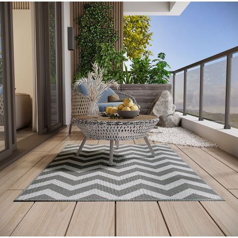 Tapis extérieur 121x182 cm polypropylène gris clair et blanc réversible pour balcon – MEUBLIV (1/5)