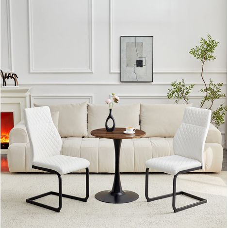 Ensemble table ronde 60 cm en MDF avec 2 chaises blanches en PU et métal noir (1/5)