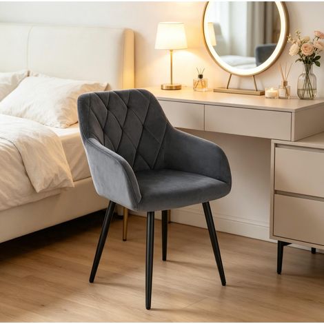 Silla de comedor tapizada en terciopelo gris oscuro con reposabrazos y patas metálicas OKWISH (1/5)