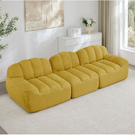 Canapé modulare in fleece granulato giallo, design frameless con ottomana collegabile, configurazione 2-4 posti (1/5)