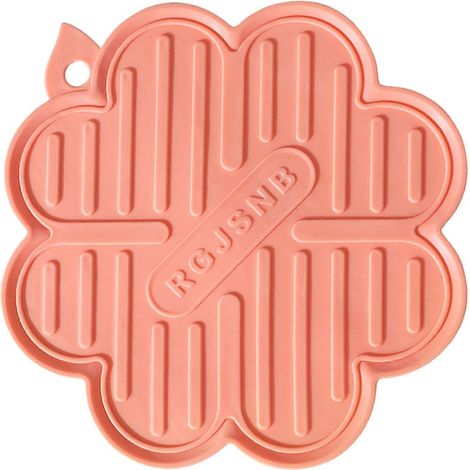 Dessous de plat antidérapant à changement de couleur activé par la chaleur, protège-plans de travail, compatible lave-vaisselle, résistant à la chaleur, pour plats chauds (rose). (1/5)
