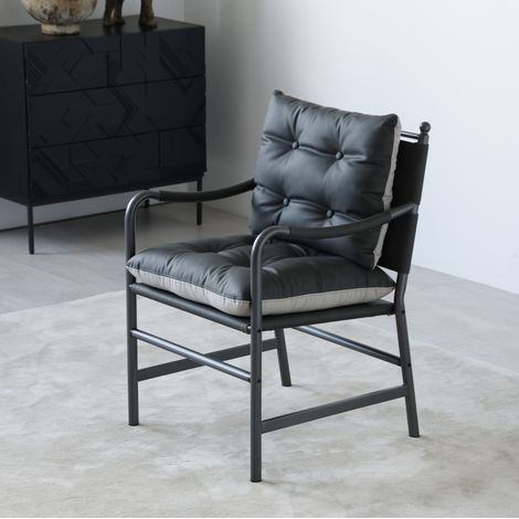 Sillón tapizado en PU negro con estructura de metal estilo mid century moderno (1/5)