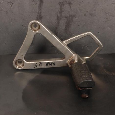 [PRODUIT D'OCCASION] Platine de repose pied pilote gauche origine pour moto Honda 125 (1/2)