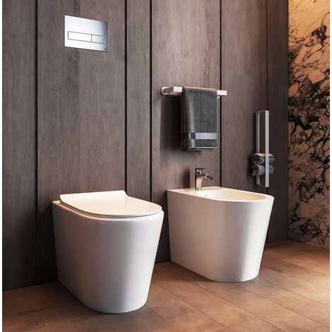 Coppia sanitari filo muro a pavimento: vaso rimless e bidet in ceramica con sedile soft close bianco lucido Linea Esse (1/5)