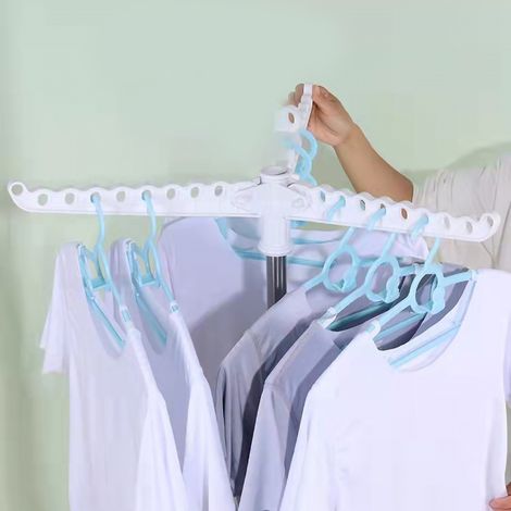 Séchoir rotatif 360° pliable en acier inoxydable, support de charge fiable, accessoire blanchisserie blanc. (1/5)