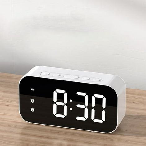 Este es un despertador de dos dígitos con tecnología LED, silencioso, control de temperatura activado por sonido y carga USB. (1/3)