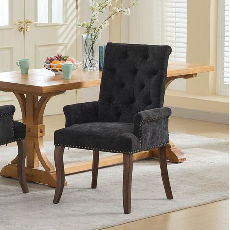Silla de comedor de chenilla gris antracita con reposabrazos, respaldo capitoné y patas de madera maciza (1/5)