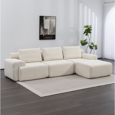 Canapé d’angle modulare in tessuto bianco 305 cm, senza telaio, con pouf scorrevole (1/5)