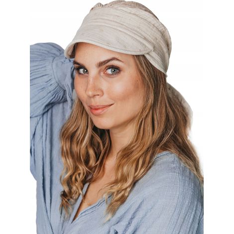 Bufanda de protección solar Tess con visera 520 en color beige claro. (1/5)