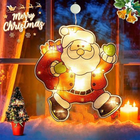 Décoration lumineuse silhouette de Noël pour fenêtre, Père Noël et sapin de Noël illuminés, fonctionne à piles et est munie d'un crochet à ventouse. (1/5)