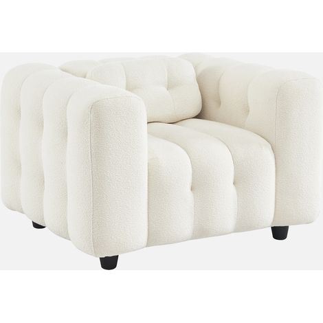 Sillón tapizado en tejido borreguito