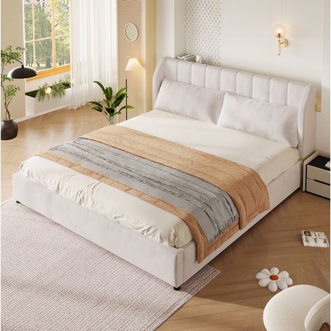 Cama adulta de 180x200 cm tapizada en terciopelo beige con somier de láminas, cabecero y 2 cojines. (1/5)