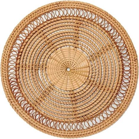 Woven basket in natural boho decor with decorative rattan decor, woven wall hanging