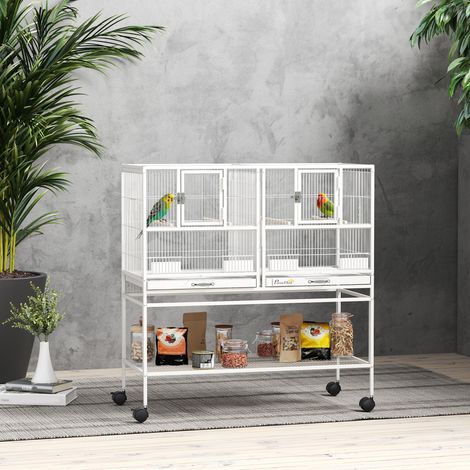 Grande gabbia per uccelli con divisorio, ruote, 4 mangiatoie, 4 posatoi, ripiano, 2 vassoi rimovibili, 95x45,5x102 cm, bianca