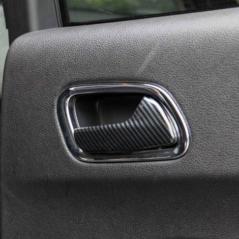 Carbon fiber interior door handle trim for 2011-2024 Dodge Durango vehicles. (1/4)