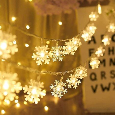 Altre decorazioni natalizie: Luci a stringa a forma di fiocco di neve, 6 m, 40 LED, alimentate a batteria, monocromatiche, con due modalità e decorazione scintillante. (1/5)