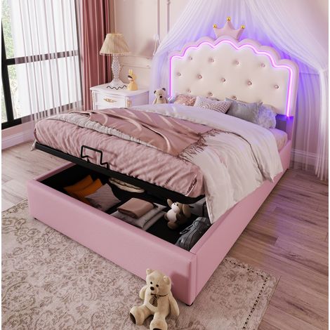 Cama tapizada princesa 140x200 cm, PU rosa, con cabecero corona, somier de láminas, luz LED y arcón hidráulico (1/5)