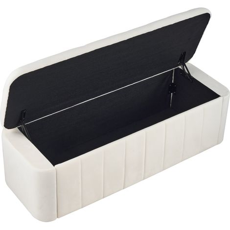 Banco de almacenaje tapizado en terciopelo beige con asiento acolchado y esquinas redondeadas HOMVRA (1/5)