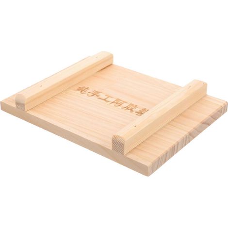 Gélatine de peau d'âne faite maison, ustensiles kaki, planche à presser le nougat, bois